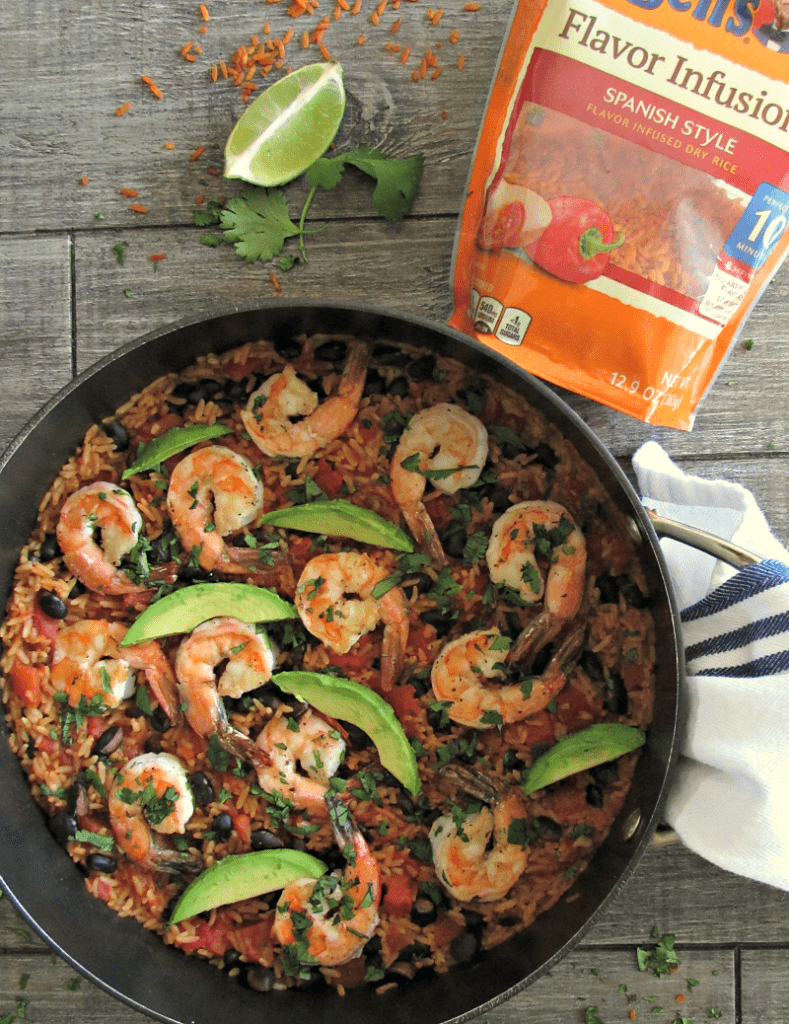 Spanish Shrimp and Rice: 1 pan + 20 minutes = shrimp, flavor infused rice in a rich, robust, tomatoey sauce with a hint of lime, black beans and avocado.