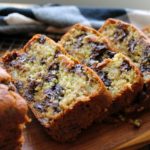 sliced zucchini banana bread on cutting board